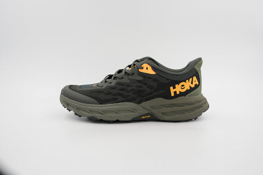 Hoka Speedgoate 5 running Gray Gold