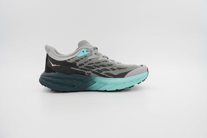 Hoka Speedgoate 5 running Gray Sky